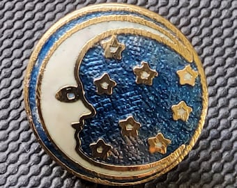 Vintage enamel moon and stars button.