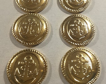 Vintage set of 8 metalized plastic gold anchor buttons.