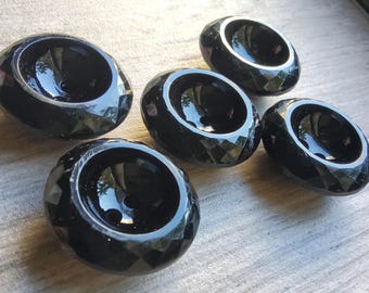 Vintage set of five large faceted black acrylic buttons.
