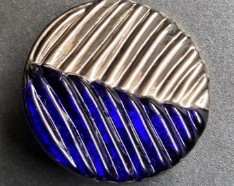 Vintage large Bimini (flaming torch) glass button.