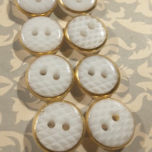 Vintage 1920's set of eight glass shirt buttons.