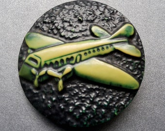 Vintage large 1930's early celluloid aeroplane coat button.