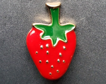 Enamel metal strawberry button.