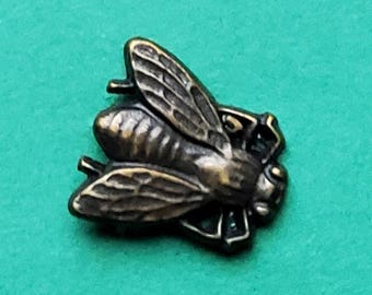 Vintage small metal fly button.