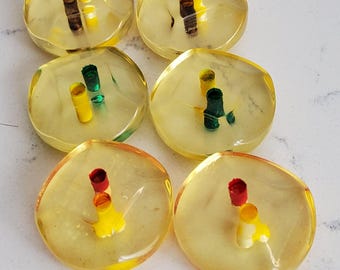 Vintage set of six clear lucite buttons.