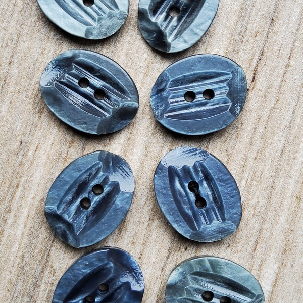 Vintage set of eight 1930's marbled grey jacket buttons.