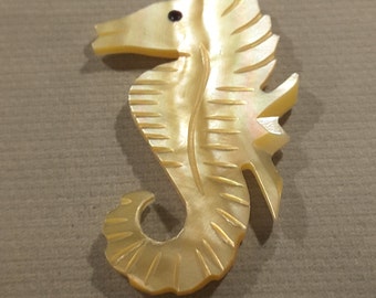 Hand carved large Mother of Pearl seahorse button.
