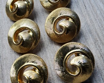 Vintage set of six metalized gold plastic buttons.