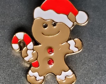 Christmas enamel ginger bread man button.