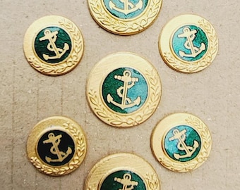 Vintage set van zeven nautische emaille knopen.