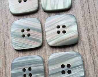 ビンテージなフェイクマザーオブパールのコートボタン 6 個セット。