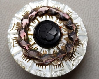 Vintage large 1800's glass and engraved mother of pearl button.