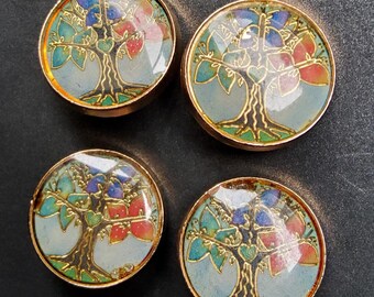 Haute couture set of four enamel jacket buttons.