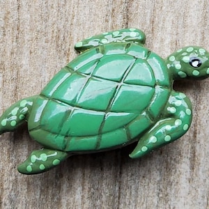 Vintage enamel and brass turtle button.