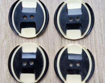 Vintage 1920-30's set of four very large buttons.
