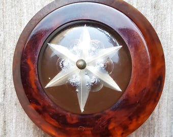 Vintage large 1930's lucite and tortoiseshell coat button.