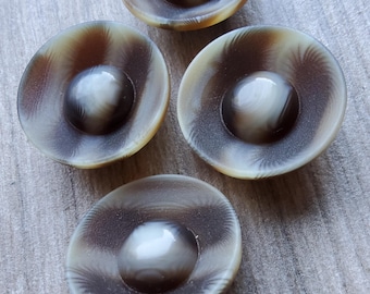 Vintage set of four large 1960's plastic coat buttons.