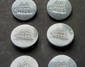 Vintage set of eight small Clipper ship uniform buttons.