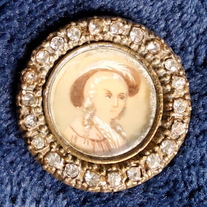 Antique 1800&#39;s hand painted portrait button with glass paste border.