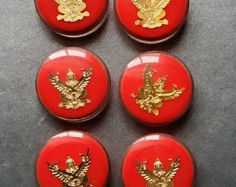 Vintage set of six acrylic Buddha coat buttons.
