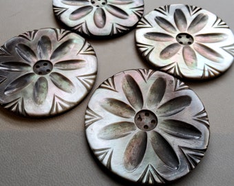 Vintage large 1900's engraved mother of pearl buttons.