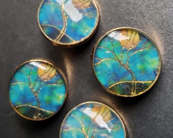 Haute couture set of four enamel jacket buttons.
