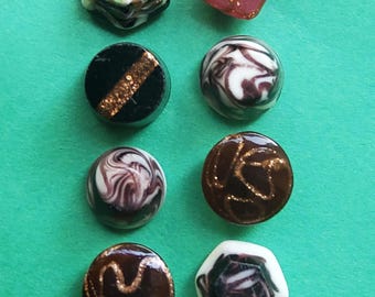 Vintage collection of 1900's glass ball waistcoat buttons.