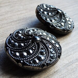 Vintage large 1920's pair silver and black glass button.