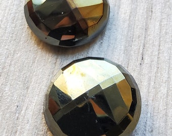 Vintage pair of large 1920's domed faceted glass buttons.