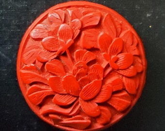 Vintage large Chinese Cinnibar buttons.