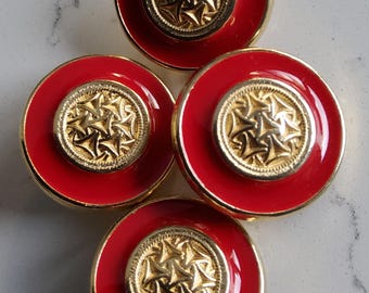 Juego vintage de cuatro botones medianos de esmalte rojo y dorado de Alta Costura.
