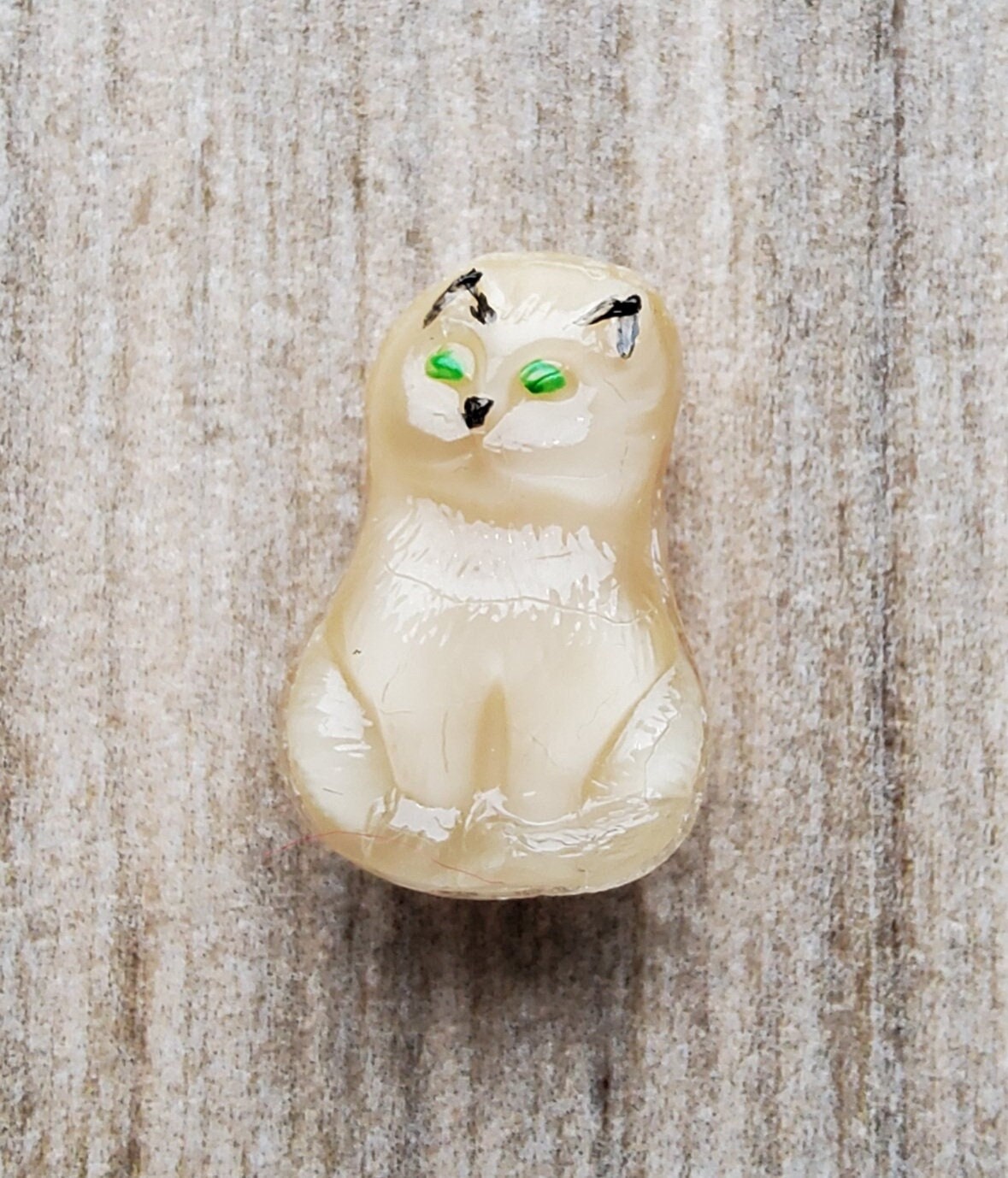 Moonglow hand painted glass ginger cat button.