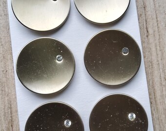 Set vintage di sei bottoni da giacca in oro spazzolato e diamanti.