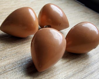 Vintage set of four 1930's early plastic coat buttons.