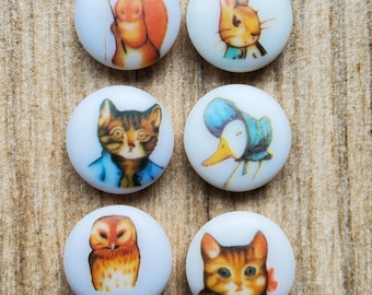 Vintage set of six Beatrix Potter buttons.