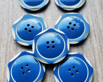 Vintage 1920-30's set of seven blue and white large plastic buttons.