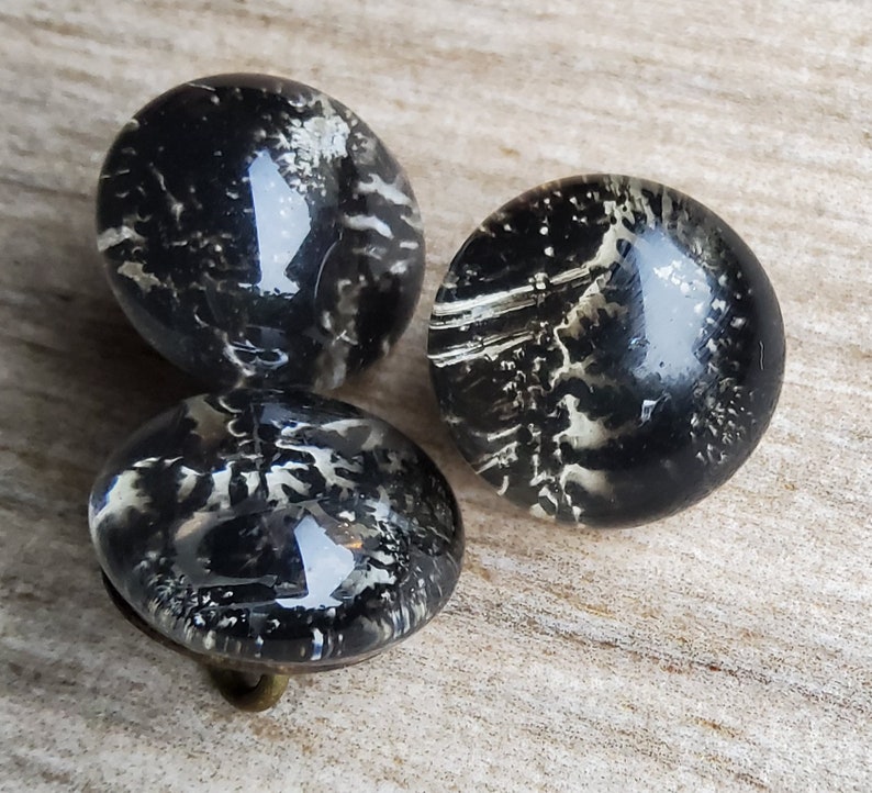 Vintage early 1900's set of three glass paperweight buttons. image 3