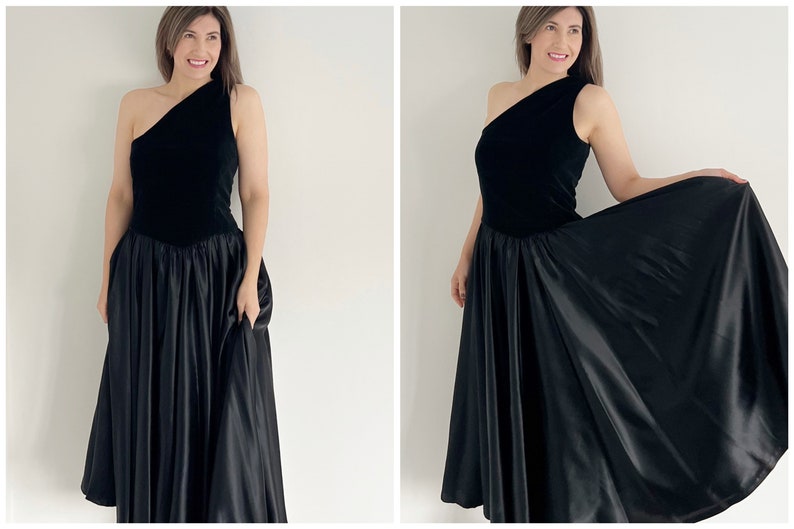 Vintage black full circle one shouldered prom dress. The bodice of the dress is velvet with a full skirt section of the dress.  The dress is mid calf and ideal for parties, occasions or the prom.  UK 12 14 today