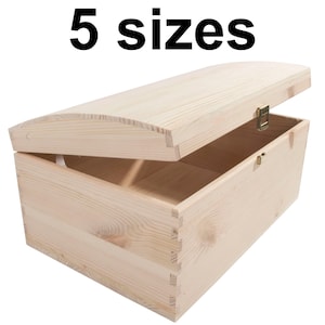 May include: A wooden chest with a hinged lid, open to reveal the empty interior. The chest is made of light-coloured wood and has a simple, rustic design. The text "5 sizes" is visible above the chest.