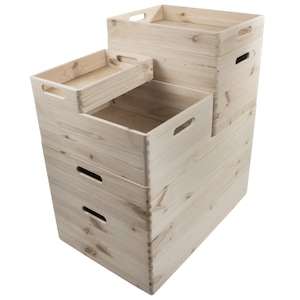 May include: Set of four natural wood storage boxes with handles. The boxes are stacked on top of each other, with the largest box at the bottom and the smallest box at the top.