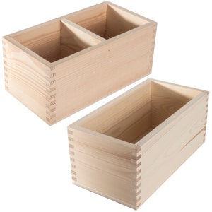 May include: Two unfinished wooden boxes. One box is divided into two compartments. The boxes are made of natural wood and have a smooth finish.