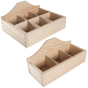 Puede incluir: Dos cajas de madera sin terminar con divisores. La caja más grande tiene seis compartimentos y la caja más pequeña tiene tres compartimentos.