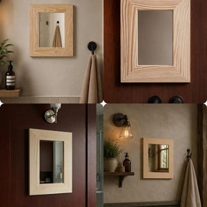 May include: Square wooden framed mirror with a light wood finish. The mirror is mounted on a wall, and a towel is hanging nearby. The mirror reflects the room's interior, showcasing a minimalist design.