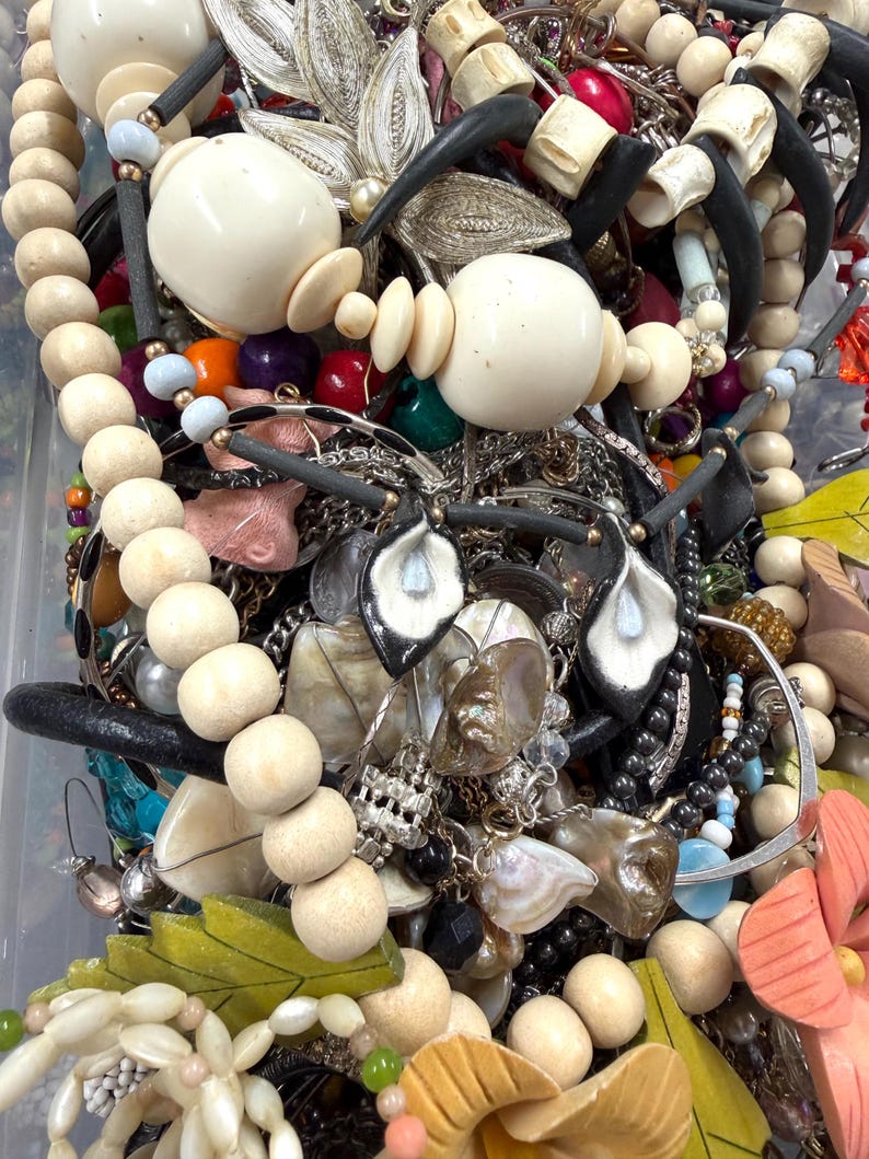 May include: A set of three ceramic mugs with a speckled, matte finish in cream, light grey, and dark grey. Each mug has a simple, minimalist design, ideal for coffee or tea.