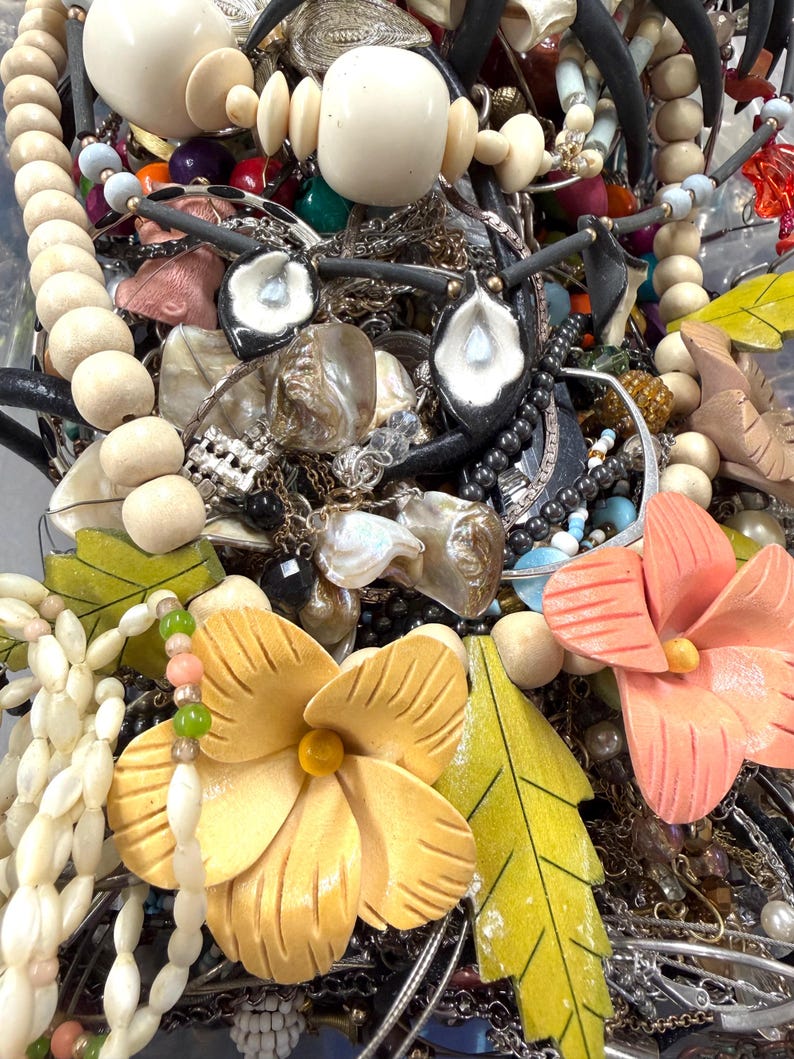 May include: A trio of ceramic mugs with a speckled, matte finish in cream, light grey, and dark grey. Each mug features a minimalist design and a rounded handle.