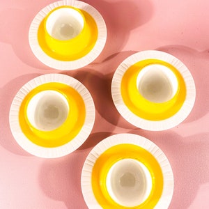 Sunny yellow vintage egg cups 4 pieces