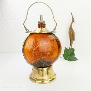 Vintage liqueur bottle, mid century liquor bottle with music box, brass, glass