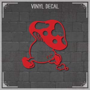 Può includere: Adesivo in vinile rosso di un personaggio a forma di fungo con macchie bianche, che cammina e soffia un soffio d'aria.