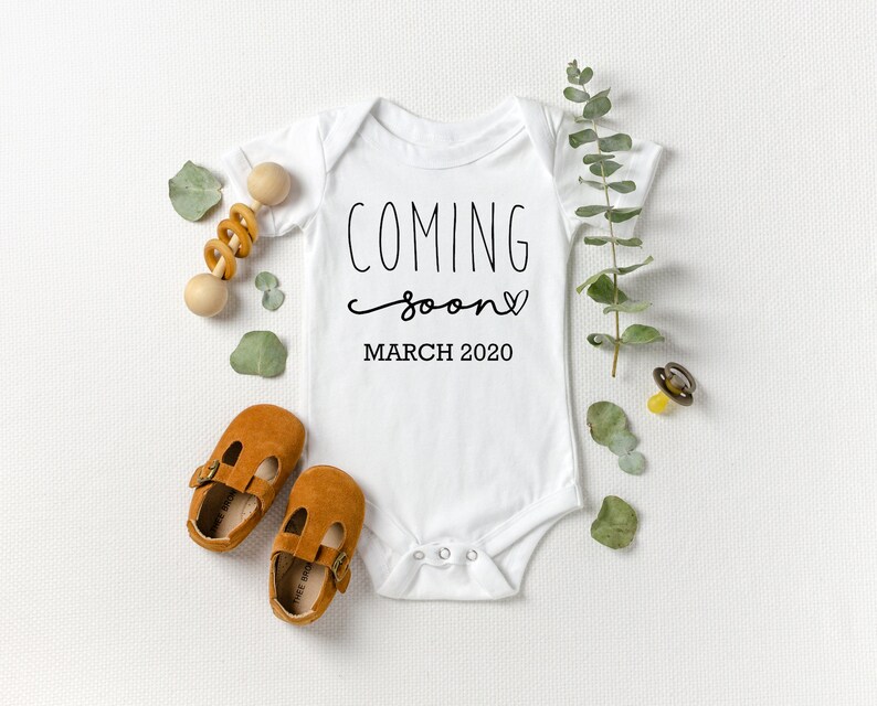Perfect for revelaing pregnancy and announcing there/'s a baby on the way Simple Coming Soon Due Date Baby Onesie\u2122