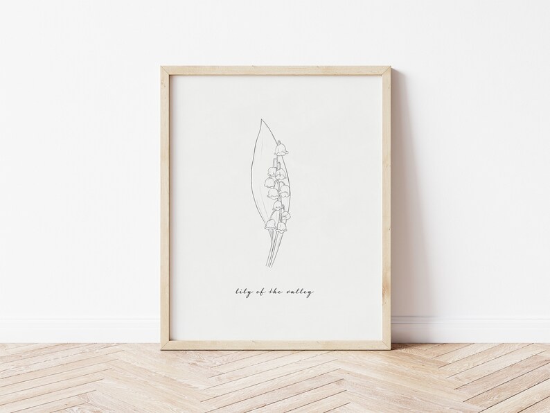 Puede incluir: Un dibujo en blanco y negro de una flor de lirio de los valles con el texto "lily of the valley" debajo de la flor.